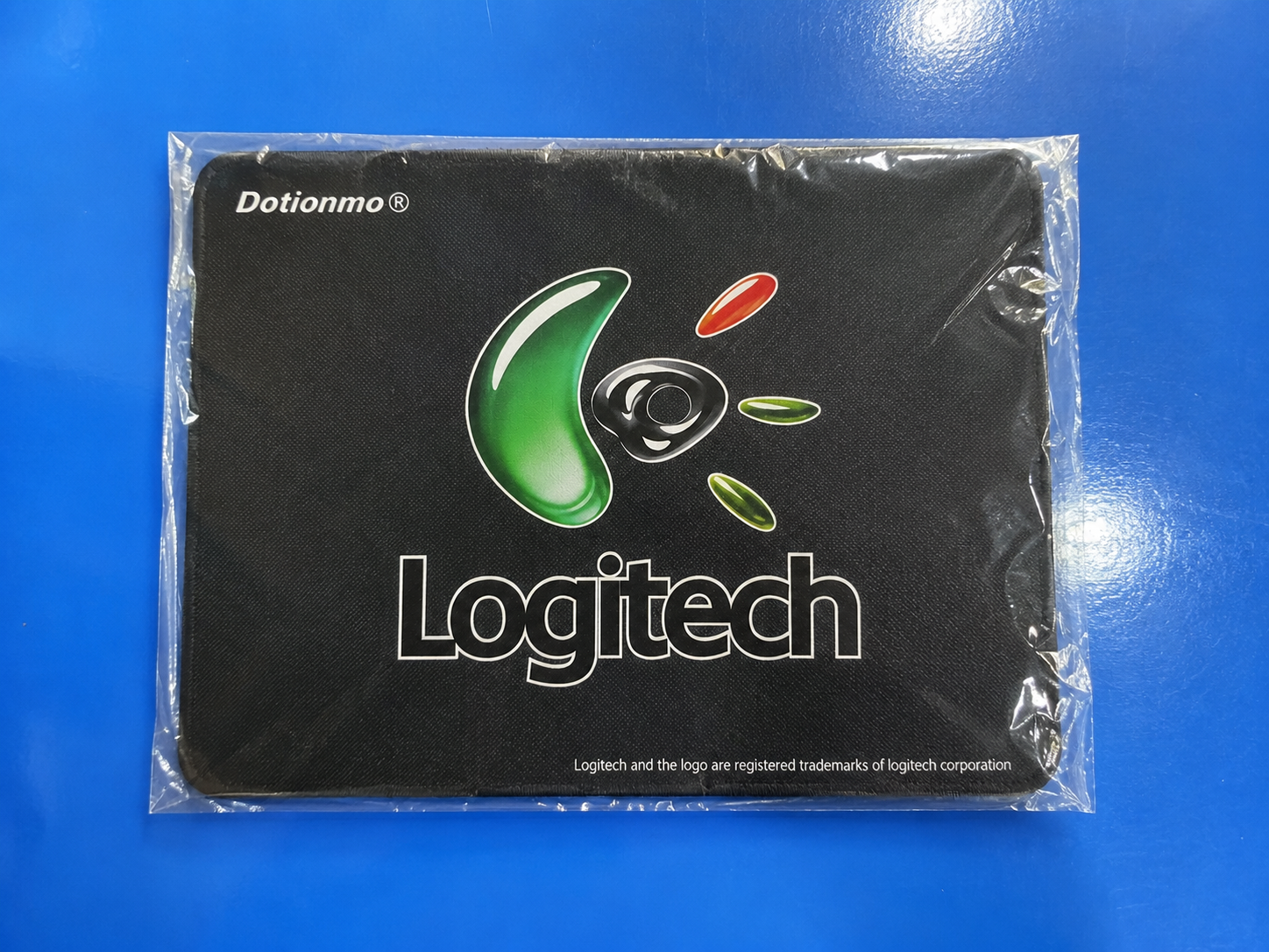 Logitech branded mouse pad, packed