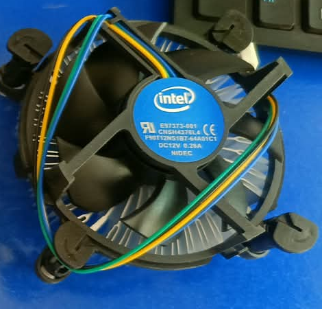 Intel original CPU cooling fan and heatsink, close-up view